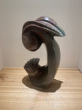 “A Mother’s Touch” by Singi Chihota